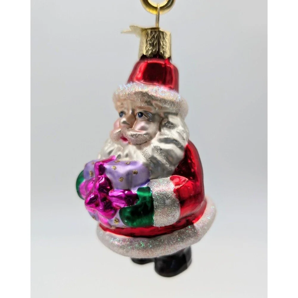 OLD WORLD CHRISTMAS Blown Glass Santa Claus Holding Gift Ornament 4